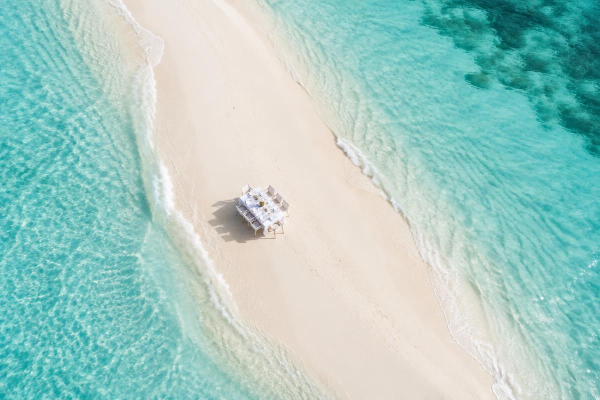 Lunch table set on a Maldives sandbank